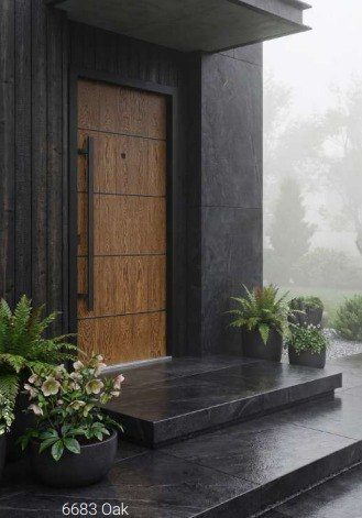6683 aluminum entry door in Oak with a long vertical pull handle